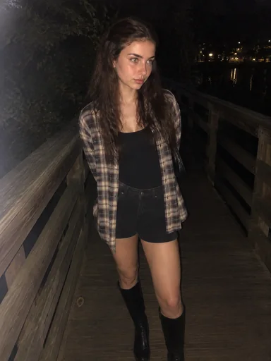 A casual portrait showing more of the scene